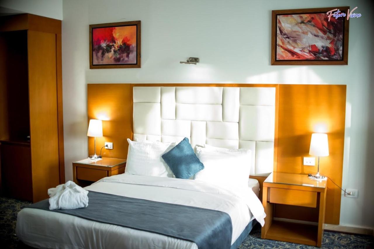Rehana Plaza Hotel Cairo Exterior photo A bedroom at the hotel